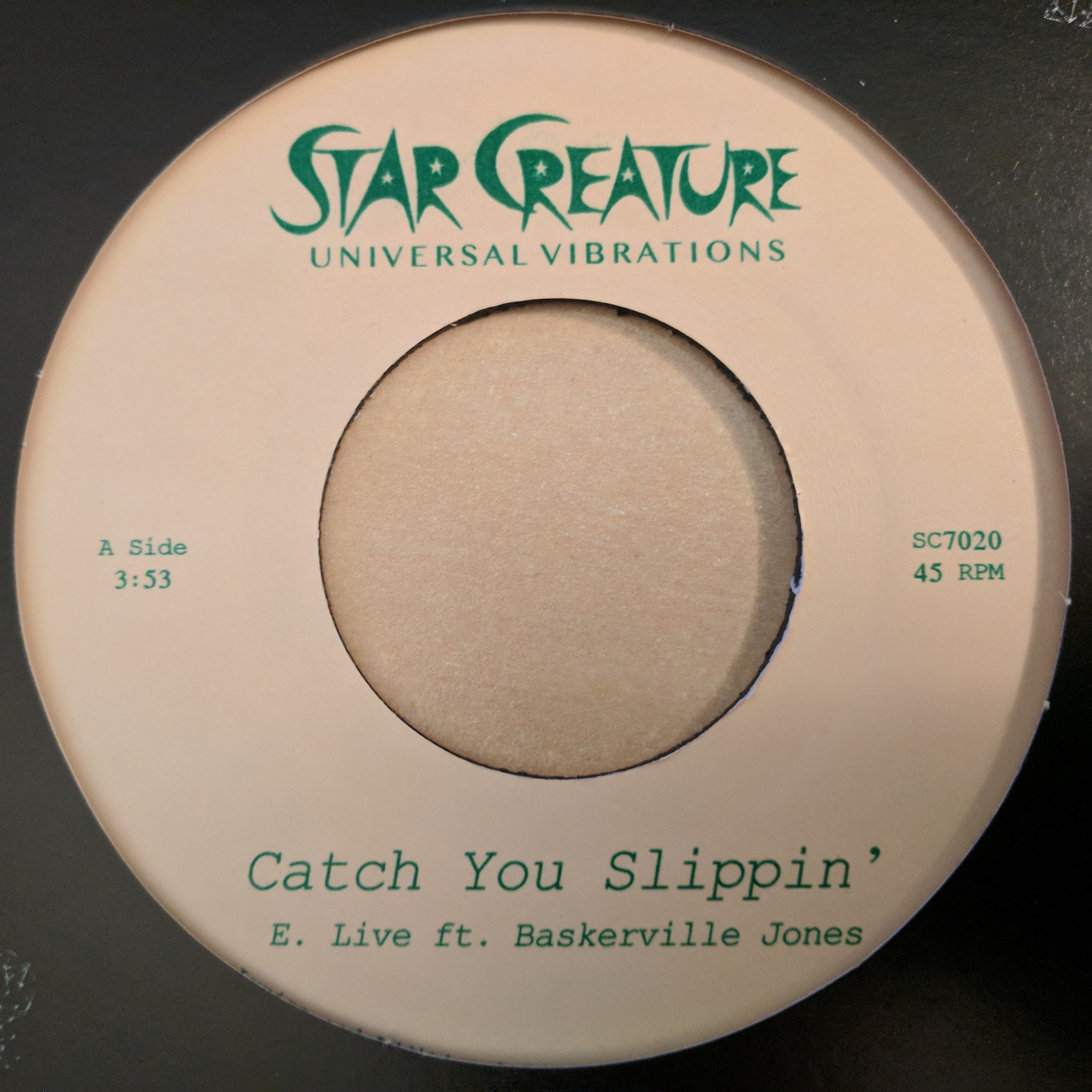 E. Live/CATCH YOU SLIPPIN' 7"